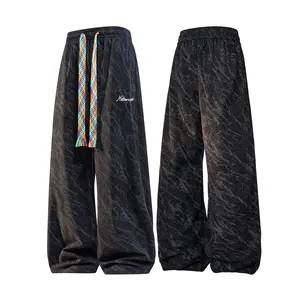 Men’s black sweatpants with marble texture—casual, loose wide-leg rainbow drawstring pants that are versatile for streetwear, everyday wear, nights out, and a dirty/grungy look. comfortable casual wear men
