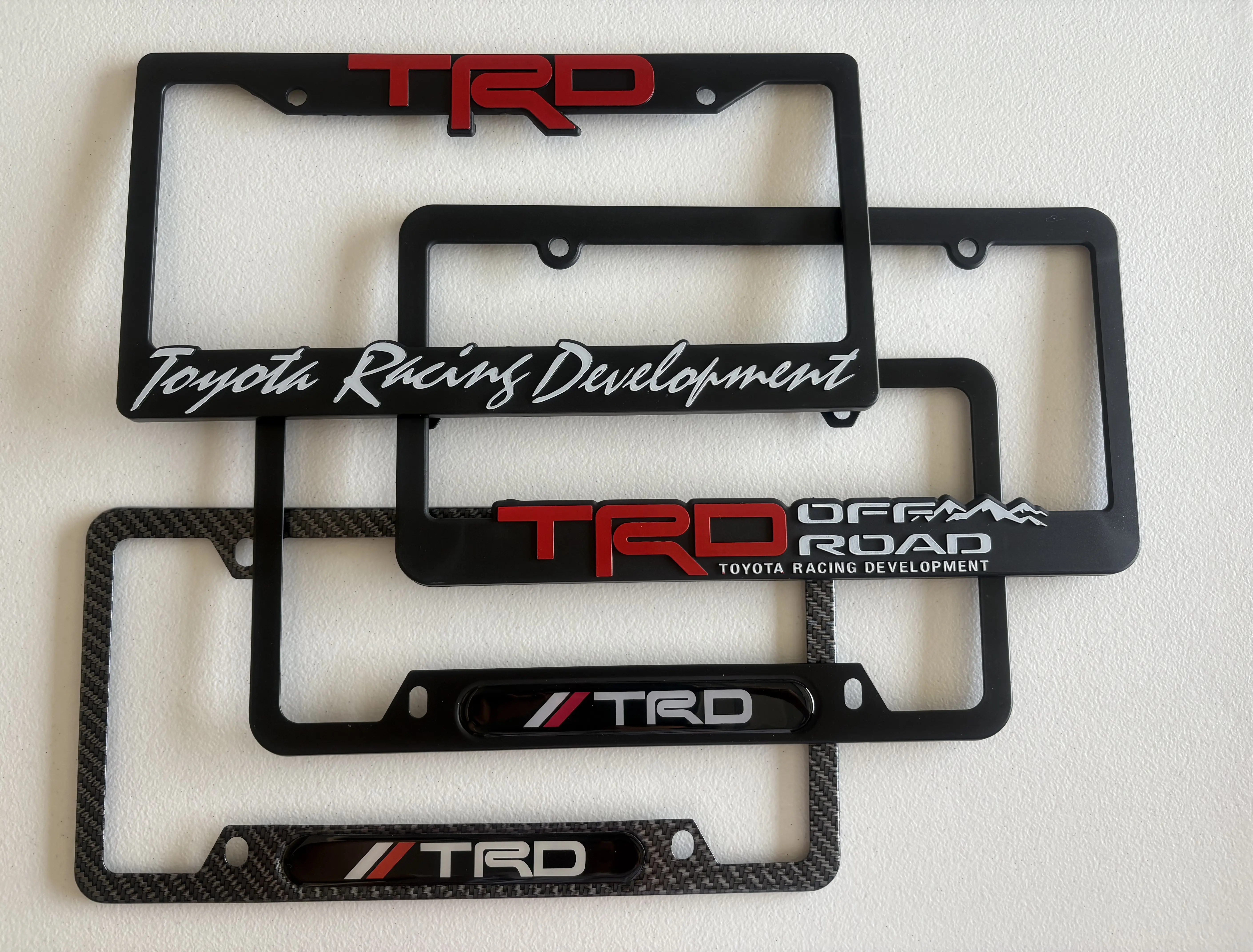 TRD License Plate Frame - Metal Alloy OR ABS Plastic - Toyota Racing Development Off Road Sport Pro Design - Black Carbon fiber with Red