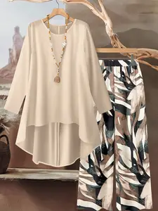 Two-Piece Ensemble Featuring an Apricot Long-Sleeve Top Paired with Loose-Fitting Long Pants Adorned with an Abstract Autumn Leaves Design. This Women'S Casual Outfit Includes a Round Neck Long-Sleeve Top And Pants, Ideal for Summer, Early Autumn