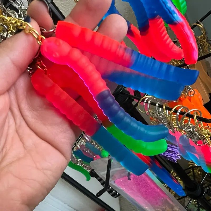 Gummy worm keychain made from resin. Unique colors.