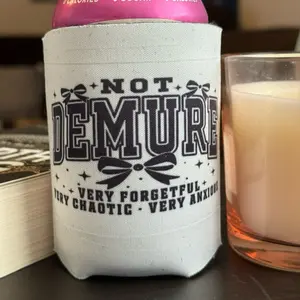 Not Demure - 12oz Can Coozie - High-Quality Neoprene Insulator - Perfect for Halloween & Fall - Makes a Great Gift