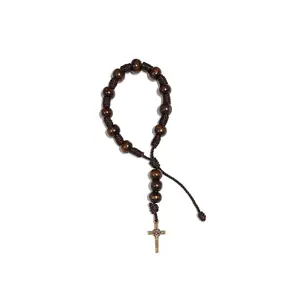 Decade bracelet with small cross of Saint Benedict made with wooden beads and adjustable cord