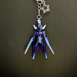 Saw Blaze Keychain with Clip - Purple Character Design Featuring Star Charm
