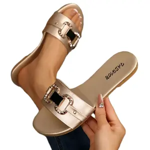 The Aura Metallic Buckle Slide for Women - Stylish Gold Sandals with Rhinestone Accents and Comfortable Fit