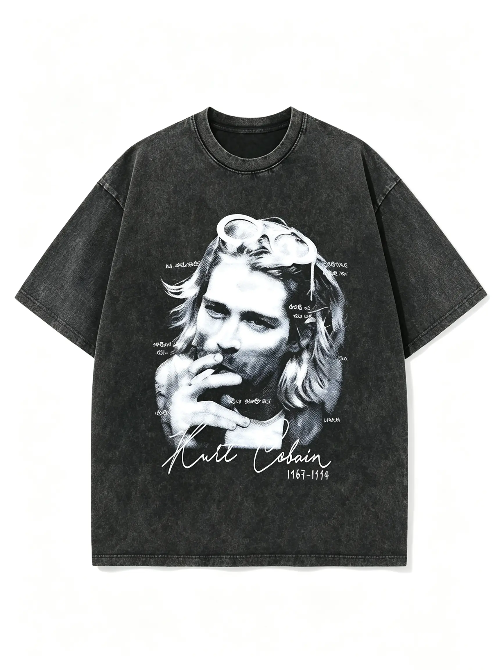 Vintage-wash T-shirt featuring a large Cobain graphic; loose-fitting, short-sleeved top with a Grunge rock aesthetic—a unisex 90s streetwear style.