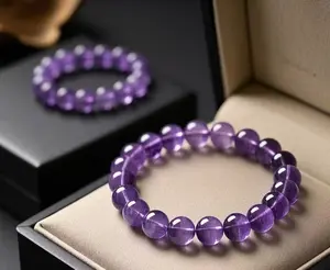 Amethyst Bead Bracelet 15mm bead diameter. Symbolizes honesty, kindness, expanding connections, peace, good fortune, and inner calm. Consecrated by Taoist masters