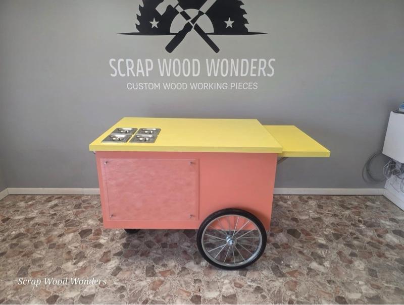 Scrap Wood Wonders Vendor Cart - Custom Woodworking Pieces with Yellow Top and Coral Body