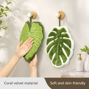 2PCS Monstera Deliciosa Hand Towels, soft hanging coral fleece material, heat absorbing, highly absorbent and lint-free. Stylish plant themed design, reusable kitchen towels for daily household and kitchen cleaning use