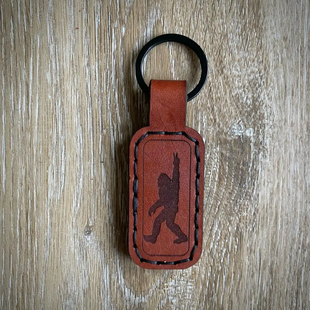 Bigfoot Custom Hand Made Leather Keychain with Unique Silhouette Design and Black Ring