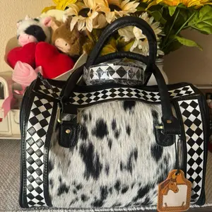 Stylish Cowhide Speedy with Checkerboard Design and Black Leather Accents for Everyday Use