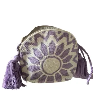 Handcrafted wayuu Round bag. Crochet woven with Long Strap for Crossbody or Shoulder Wear.  Multiple Designs Available.