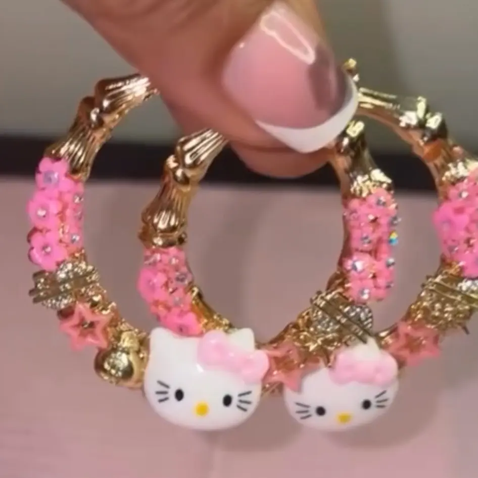 Hello kitty junk hoop earrings