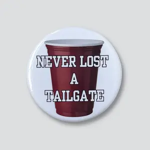“Never Lost a Tailgate” Garnet Magnetic Game Day Button