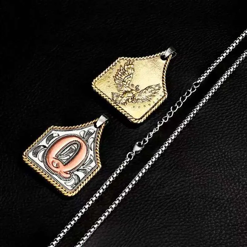 Western-style initial pendant necklace, two-tone engraved tag, silver chain, vintage cowboy style, personalized first-letter accessory