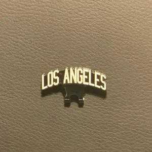 Los Angeles gold rhinestoned hat brim clip, stylish accessory for fashion-conscious individuals
