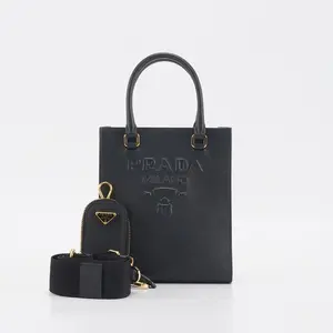 Pre-owned PRADA leather Crossbody Bags Enameled Metal Triangle Mini Top Handle Bag BGP208323