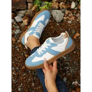 Women's blue and white color - block casual sneakers, featuring lace - up design, comfortable and breathable daily walking shoes, versatile sports casual shoes, retro - style fashion sneakers with brown sole, ideal footwear for seasonal transition