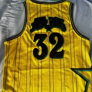 Basic Yellow 32 Jersey - Classic Design with Bold Number 32 and Green Accents