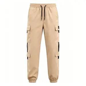 men's cargo pants, cargo joggers, streetwear trousers，Multi pocket design, elastic waist, drawstring work pants，everyday streetwear, gorpcore style, casual utility outfit, neutral tone fashion
