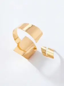 Bohemian minimalist bracelet and ring set, with a retro, understated luxury feel.
