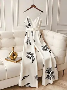 This Tropical Print Jumpsuit is Vacation Ready Strap Wide Leg with Belt