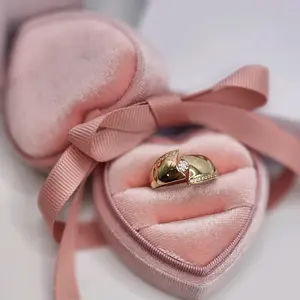 Ring with central stone