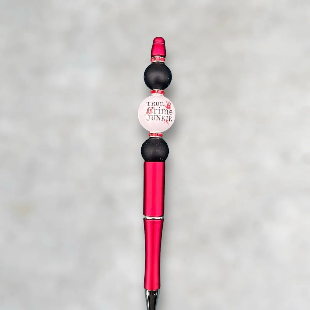 “True Crime” beaded pen