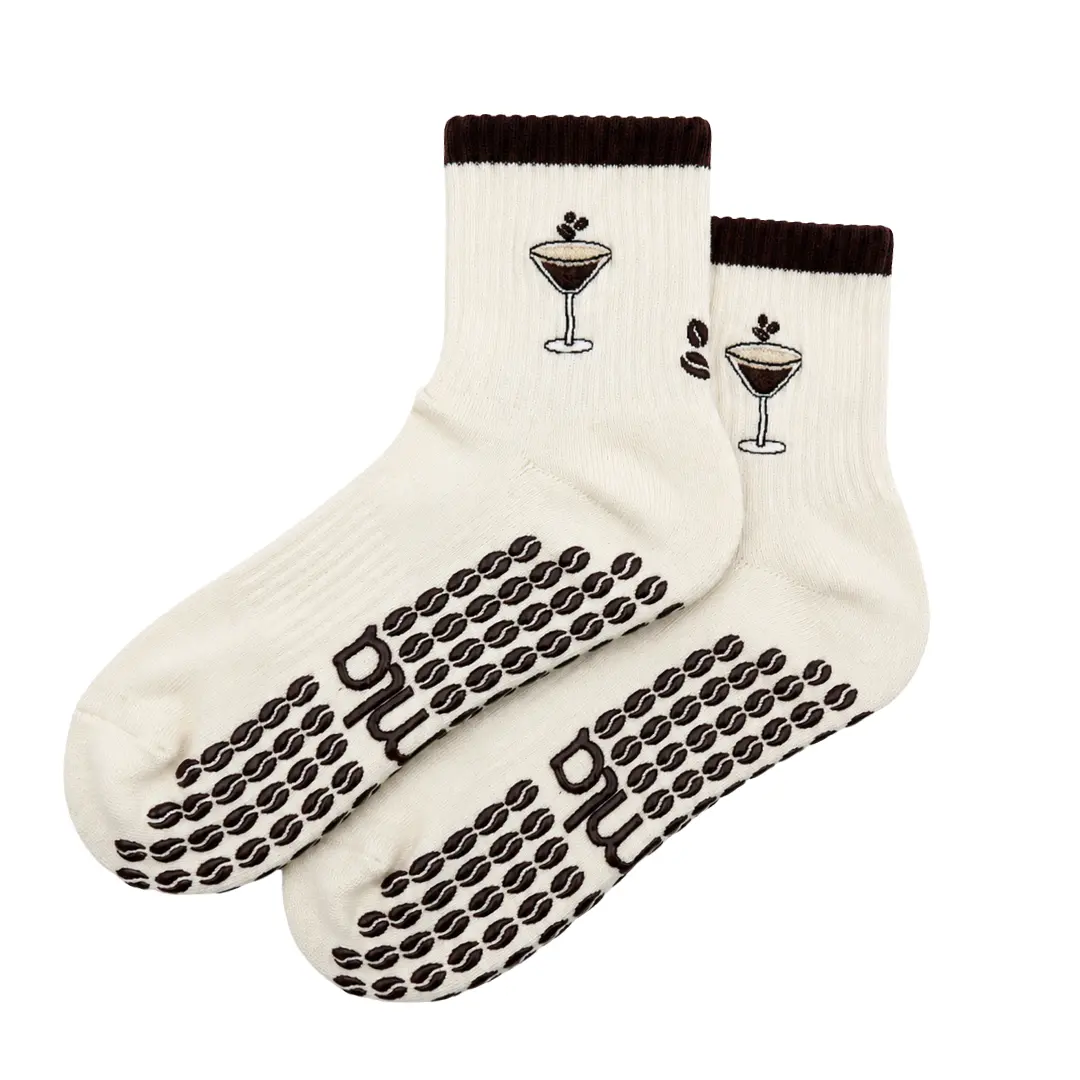 The Espresso Martini Embroidery Grip Sock with espresso bean grips for Pilates, Barre, Lagree, and Yoga