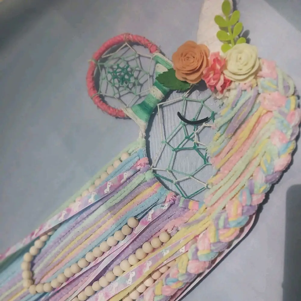 Unicorn Dreamcatcher: Colorful Design with Floral Accents and Beaded Details