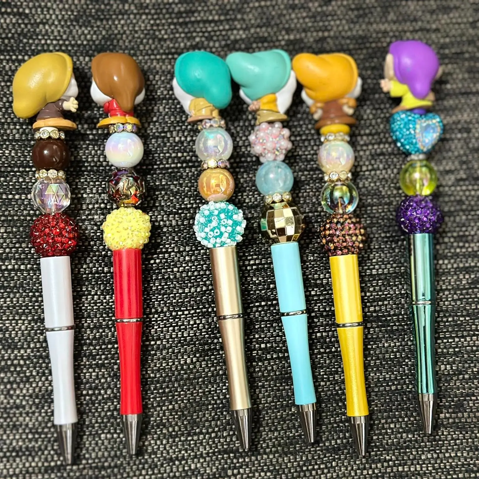 Office Doorables Pens Collections with Black Ink Refill Acrylic Beads & Character Figure Customizable Writing Tools