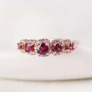 Rose Gold Plated Red Garnet & Cubic Zirconia Ring for Women |   Graduated Stone Design |   Sparkling Paved Accents |   Hypoallergenic & Durable |   Perfect for Daily Wear, Date Night & Gift |   Trendy Romantic Jewelry Gift for Her