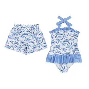 Dive into Coolness: Matching Blue and White Turtle - Print Kids’ Swimsuits for Summer