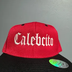 Small baseball caps, custom made with name/last name