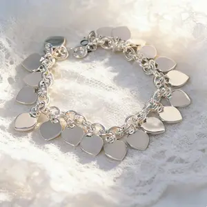 Minimalist Luxury Bracelet Shining OT buckle paired with dainty heart-shaped pendant, effortlessly capture the sweet cool lady aesthetic