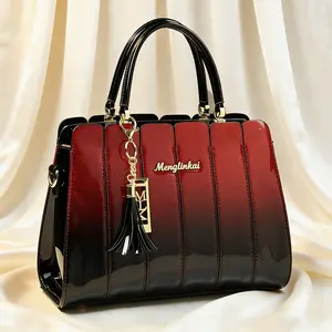 Light luxury red and black gradient patent leather handbag | Sparkling tassel gold embellishment | Essential for workplace dating outfits