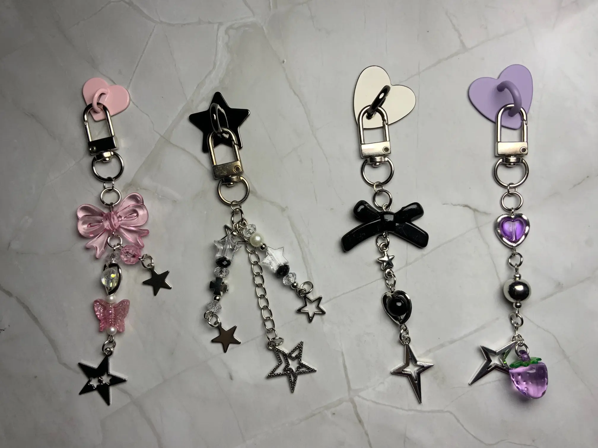 Cute chain charms for kindles, phones, tablets or any handhelds.
