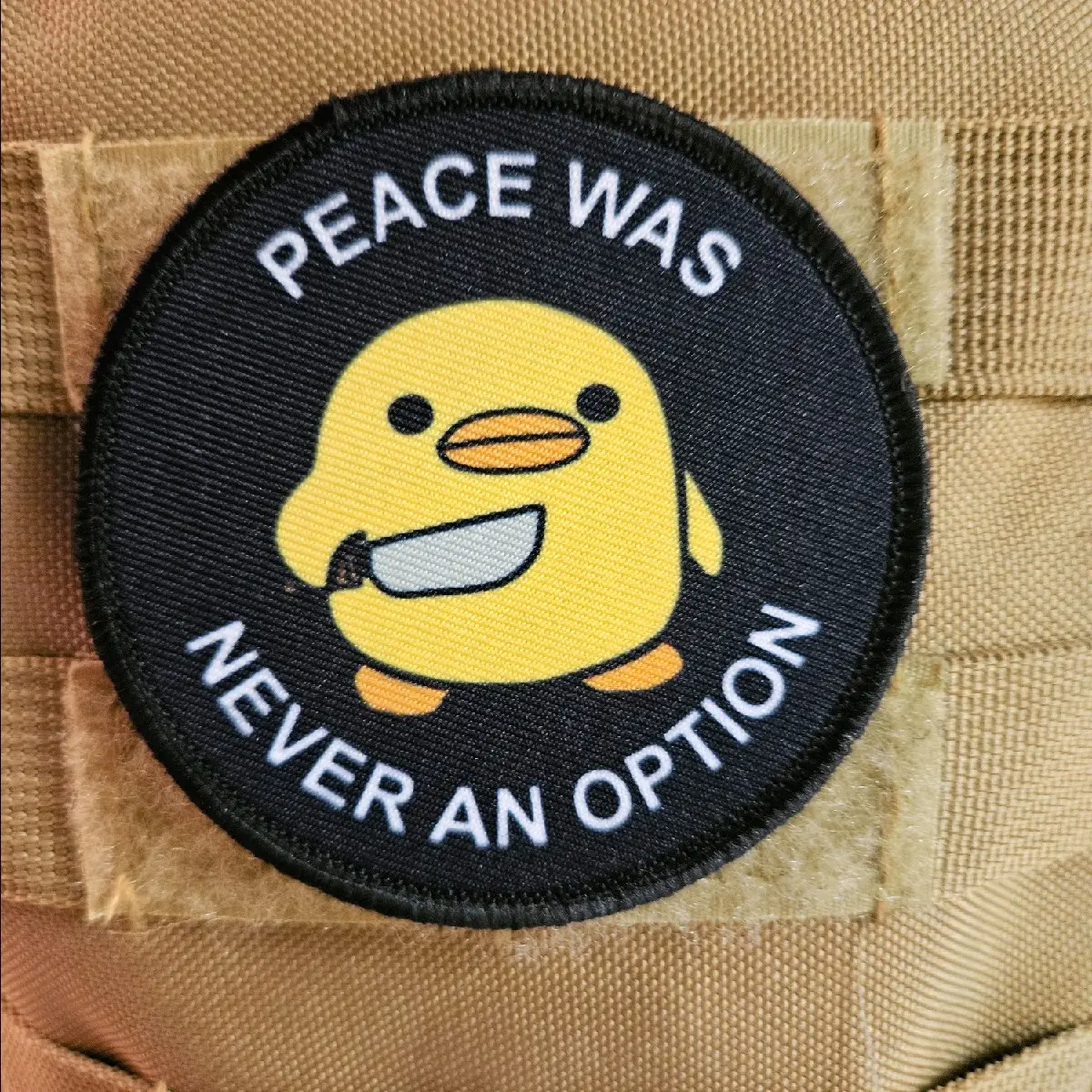 Peace was never an option cute duckling meme 3" circle removable morale patch with hook and loop backing