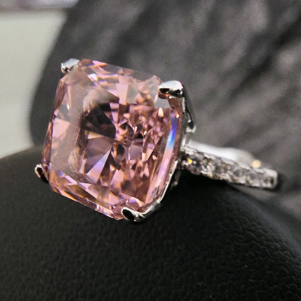 High-Quality Silver Ring with Pink Stone and White Zirconia Wing Accent