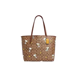 COACH x Peanuts Snoopy Dempsey 33 Tote Bag for Women, Classic Monogram Snap-Closure Faux Leather Handbag, Brown