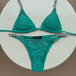 Emerald Green Swimwear by Cherry Bikini - Featuring padded triangle top, embedded with crystals and rhinestones on the neckties, amd high-waisted cheeky bottoms with crystals and rhinestones - for a stunning, luxurious fashionable look at the beach, pool