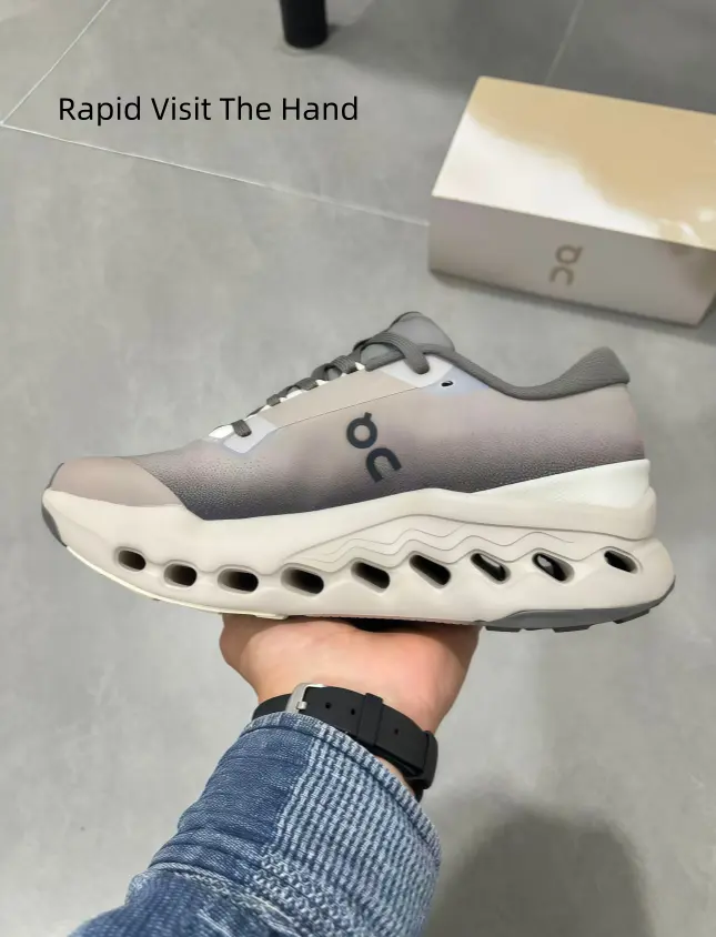 Functional outdoor running footwear with ventilated gradient gray matte fabric upper. Shock-absorbing hollow milky curved foam midsole with airflow holes, anti-slip gray outsole, perfect for city walks and light hiking.