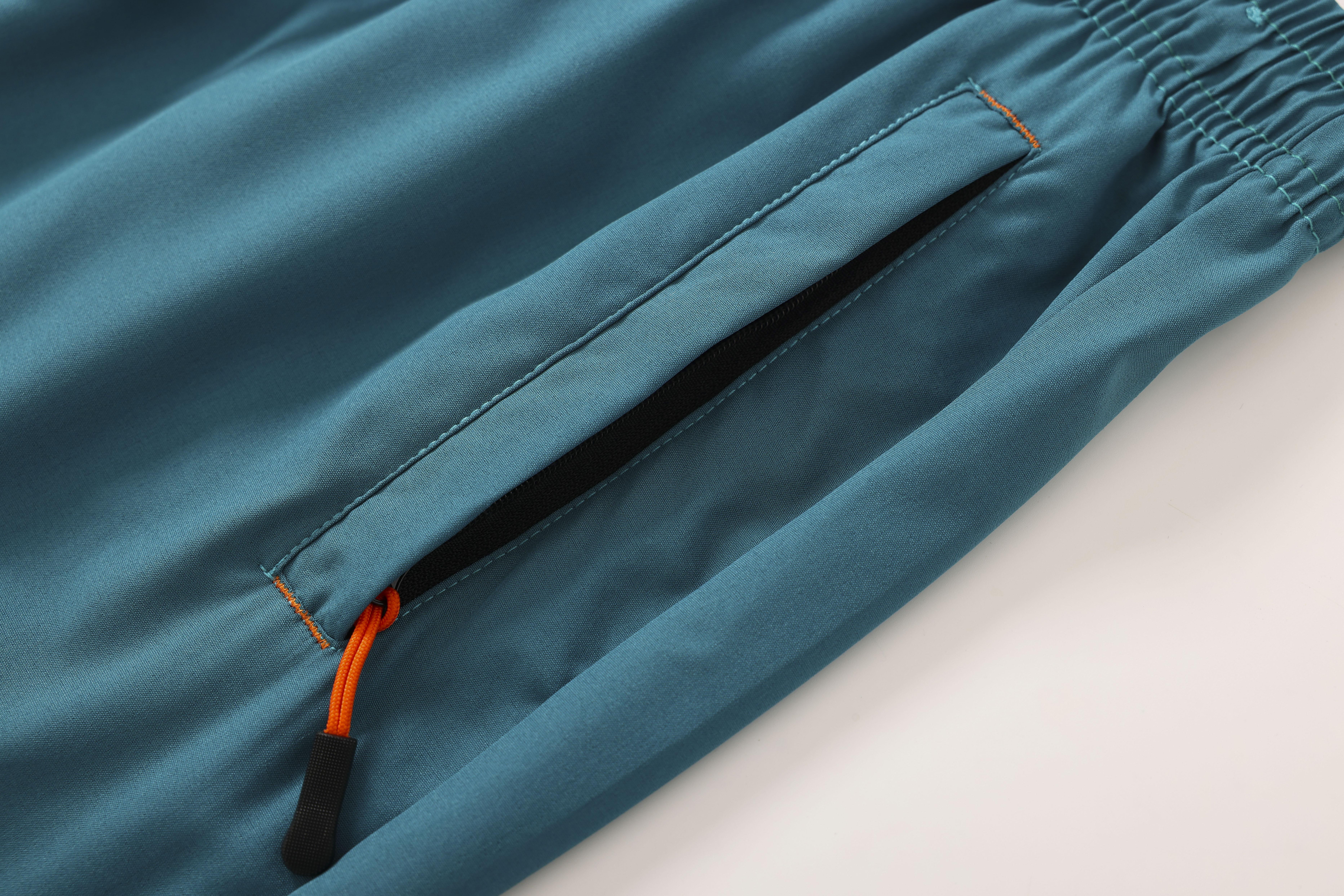 Men’s solid-color  with zippered pockets and drawstring; men’s everyday bottoms; sports- elastic-waist pocket shorts; spring/summer shorts—an ideal choice for daily  wear and athletic outfits. men's shorts Casual Breathable Quick-Dry