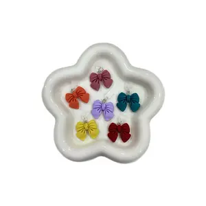 Kindle Charm - Dust Plug with Colorful Bow Designs for Stylish Protection