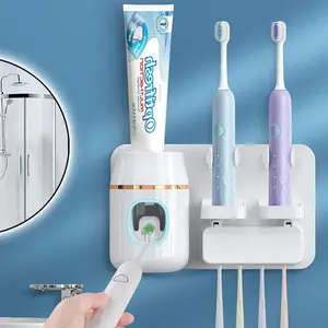 Toothpaste Dispenser, Automatic Toothpaste Dispenser, Space-Saving Toothbrush Holder Wall Mounted for Bathroom, Toothpaste Squeezer, Electric ToothpasteDispenser for Kids with 4 Toothbrush Slots