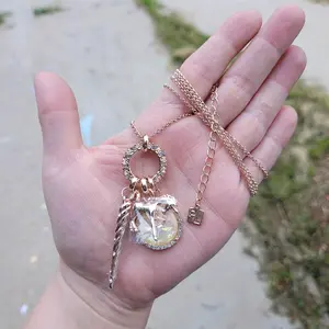 rose gold plated unicorn long drop necklace