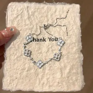 Rich daughter is full of diamonds, four-leaf clover, white fritillary pulling bracelet, women's super flash exquisite light luxury celebrity bracelet