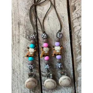 Sitting Highland Cow Pacifier Holder