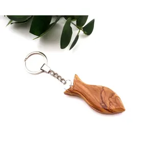 Hand-Carved 3D Olive Wood Fish Keychain, A Symbol of Christianity and Faith Crafted from the Holy Land's Blessed Olive Trees.