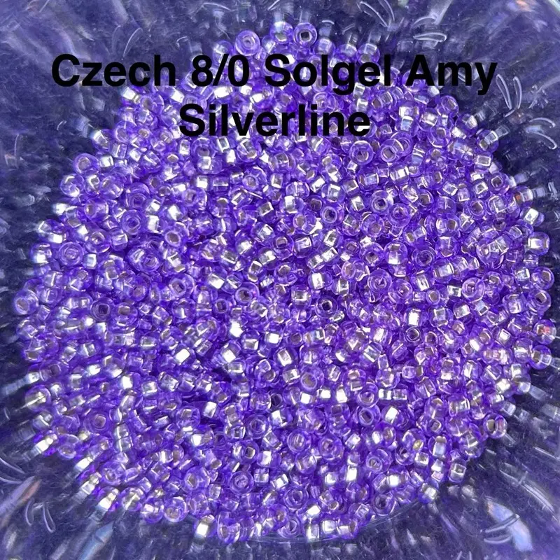 Assorted Colors of Silver-lined Seed Beads Brand: Preciosa Ornela (Czech)  8/0 or 3mm Color: Amy S/L Solgel, Light Pink S/L Solgel, Gold S/L, Crystal Clear S/L, Green S/L, Dark Green S/L  Packaging: 10 or 50 Grams