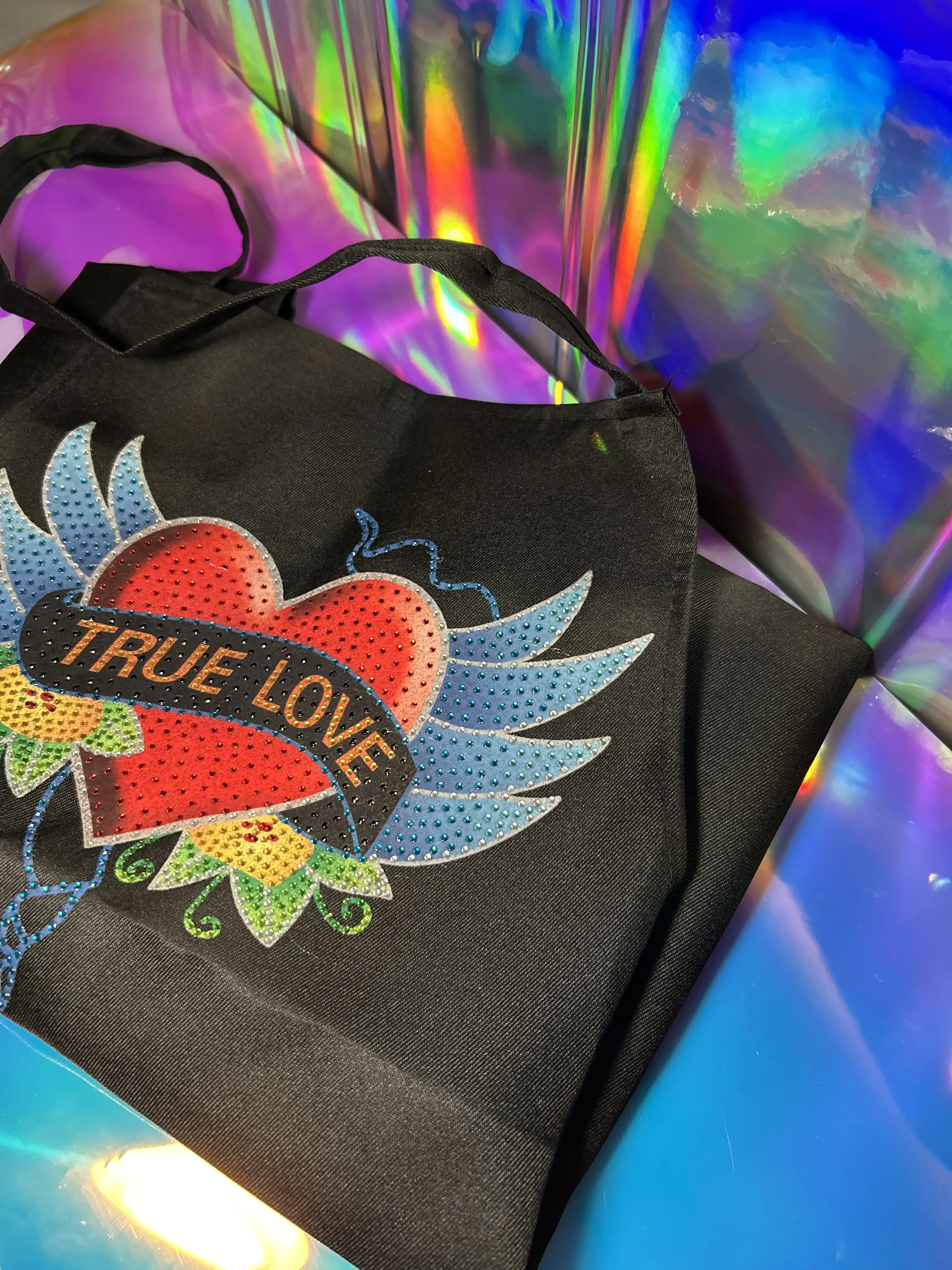 Black Apron with Rhinestone Design - Heart and Wings Tattoo Style, Perfect for Any Occasion